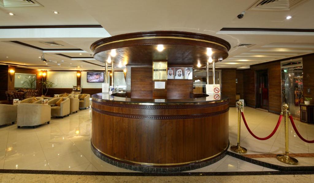 The curved timber reception desk